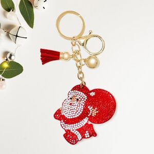 Festive Santa Keychain with Red and Gold Accents